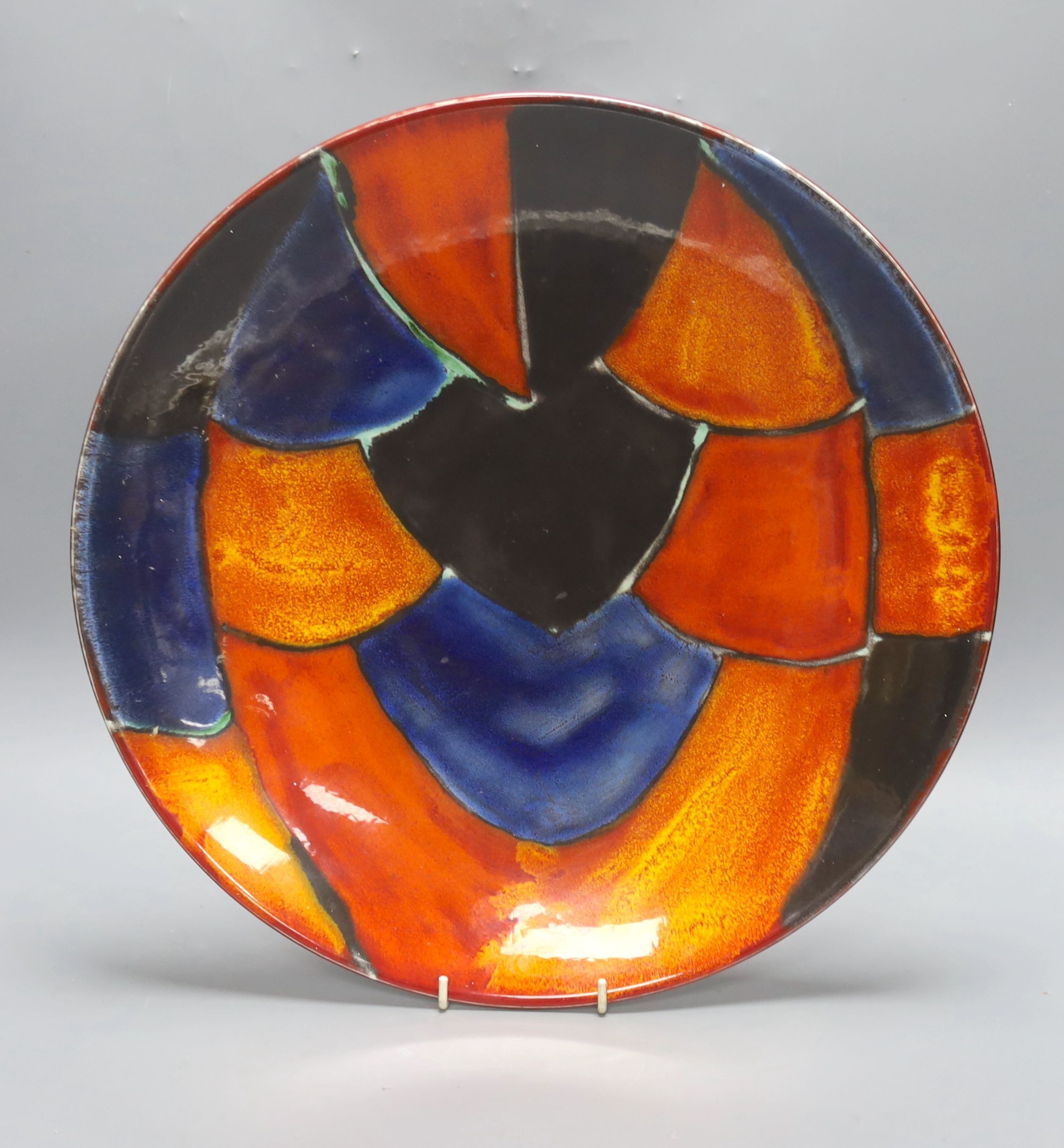 A 1960's Poole pottery charger, 40cm